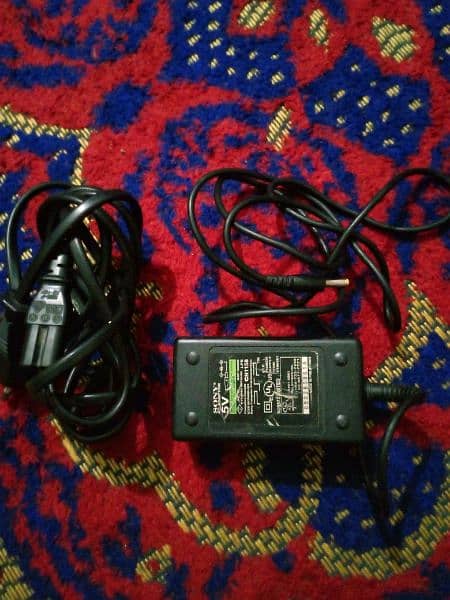 BATTERY, CHARGER AND SD CARD ADAPTER OF PSP 7