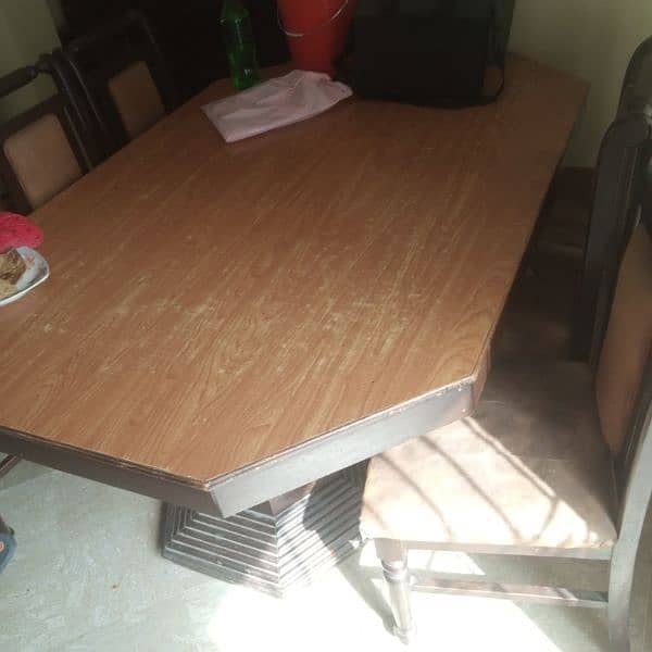 dining table with 6 chairs. solid table with chairs in a good conditi. 1