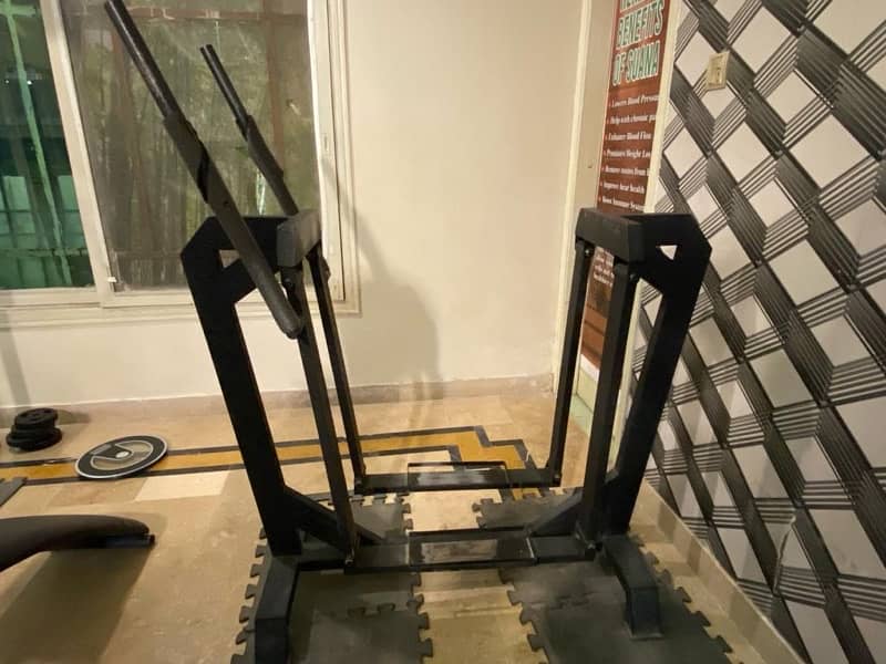 Adjustable Bench Press, Manual Stepper Machine, Rowing Machine. 4