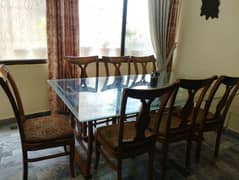 A Luxury Wooden Dining Table with 8 Luxury Comfortable Chairs 0
