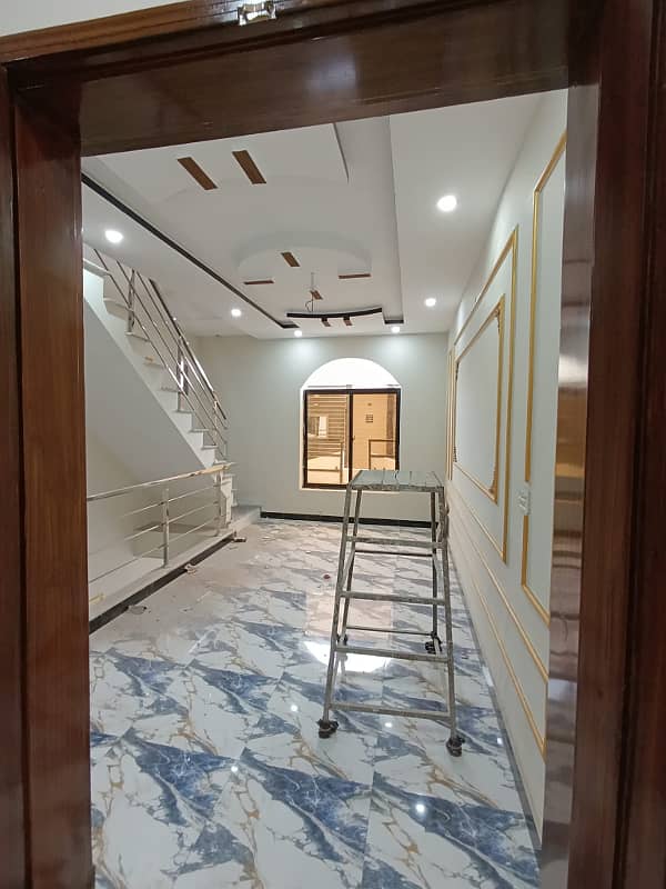 5 marla brand new house is available for sale in Rehman Garden housing scheme phase 4 canal road near jallo park lahore. 14