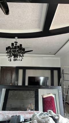 black chandelier with 4 wall lights