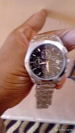 Tissot watch chronograph and with date