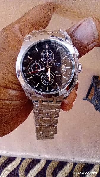 Tissot watch chronograph and with date 1