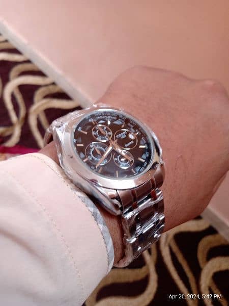 Tissot watch chronograph and with date 6