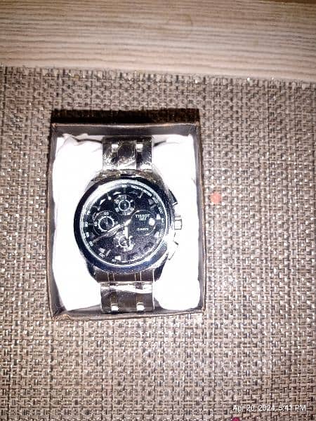 Tissot watch chronograph and with date 7
