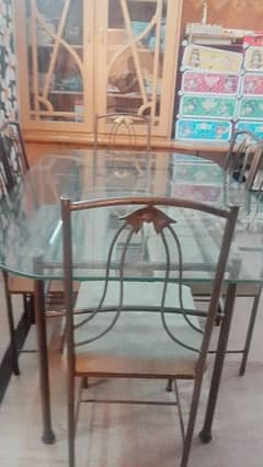 good condition rod iron chairs ad tabek