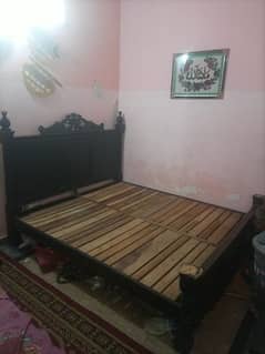 used wooden bed