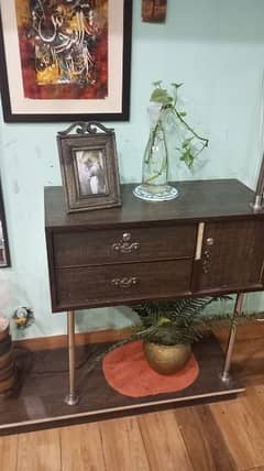a unique and antique style table with drawers with big mirror,
