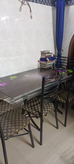 Beautiful dining table with six  chairs for sale.