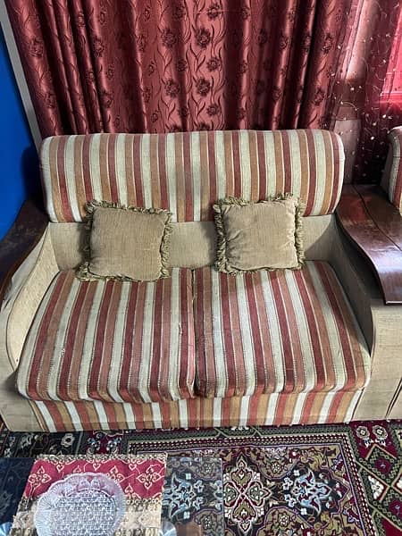 7 seater sofa set and table for sale 1