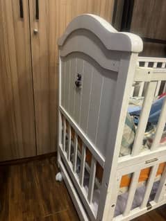 Tinnies wooden cot for sale