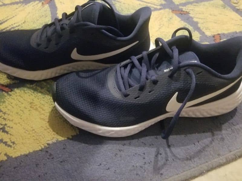 Nike Revolution running sport shoes for men . size uk9 2