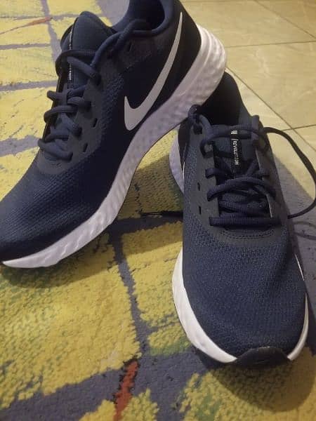 Nike Revolution running sport shoes for men . size uk9 5