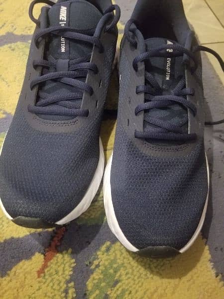 Nike Revolution running sport shoes for men . size uk9 6