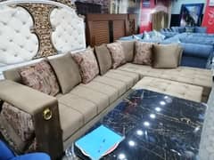 L shaped sofa with puffi