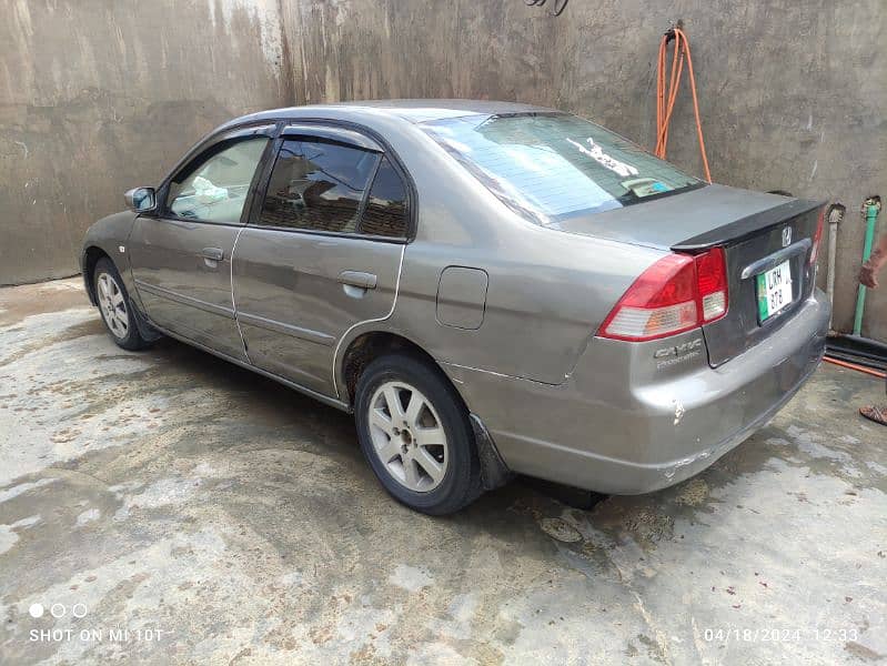 Civic 2002/3 ,. 0346 8655527 4