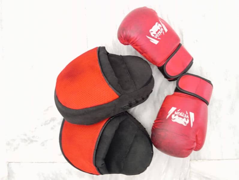Venum 12 OZ Medium black shade red boxing gloves and defender 0