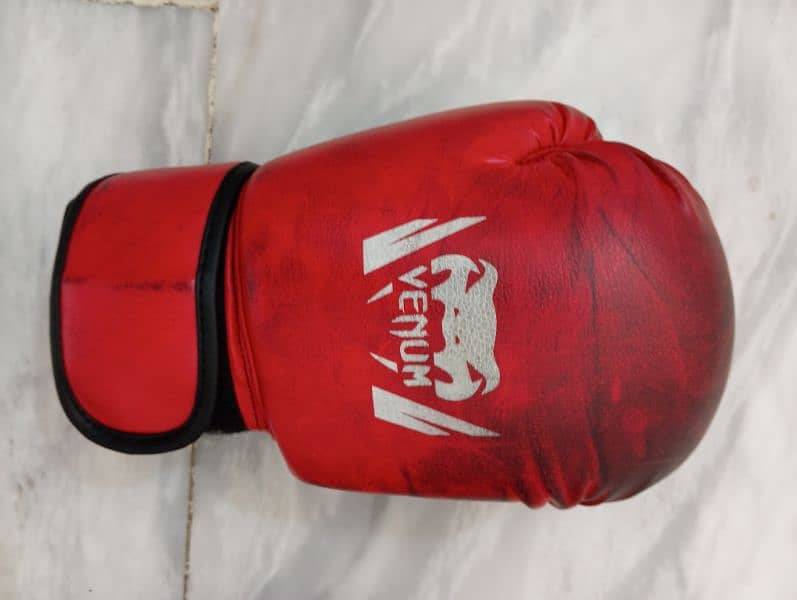 Venum 12 OZ Medium black shade red boxing gloves and defender 4