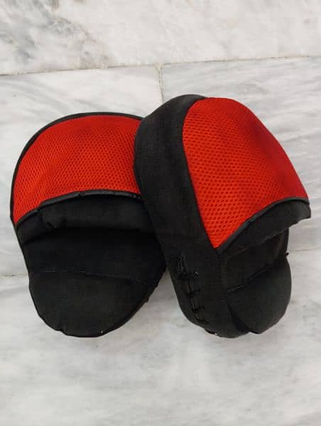 Venum 12 OZ Medium black shade red boxing gloves and defender 7