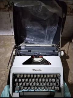 Typewriter Olympia Branded/Vintage for sale