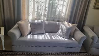 casabella five seater sofa set and painting