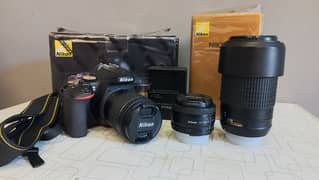 Nikon D5600 with 18 -55 kit lens, Nikon 70 -300 zoom lens , 50 mm lens