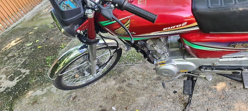 honda 125 janwan condition ma ha 2 owner ha bike bilkyl saf ha 5