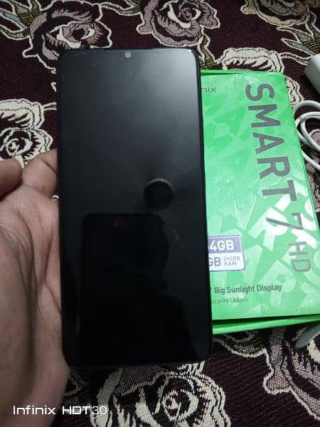 infinix smart 7hd  with box 10/10 condition under warranty 6