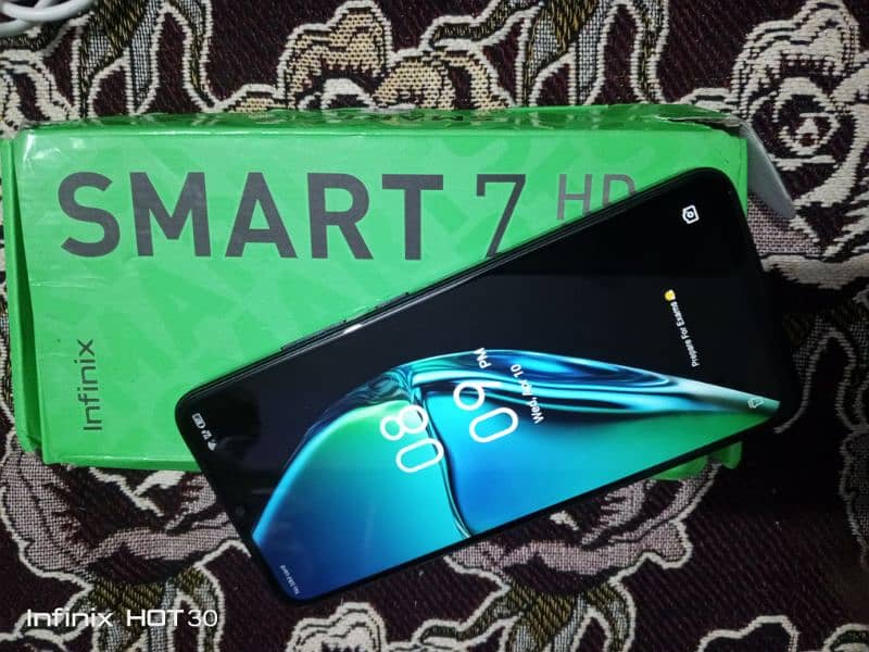 infinix smart 7hd  with box 10/10 condition under warranty 9