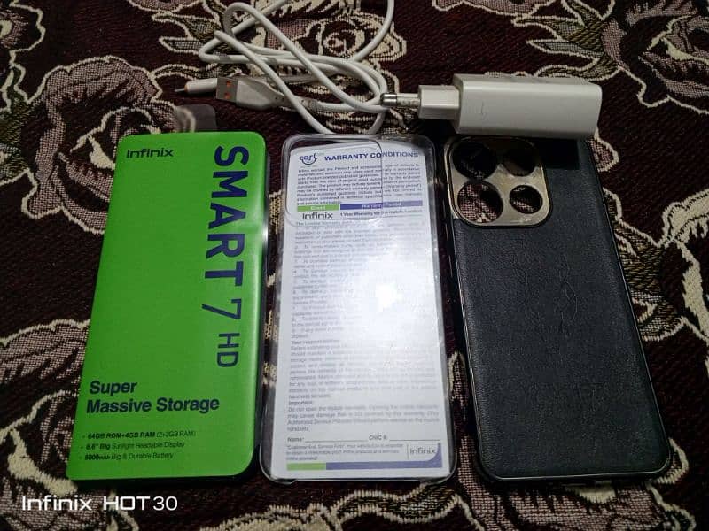 infinix smart 7hd  with box 10/10 condition under warranty 12