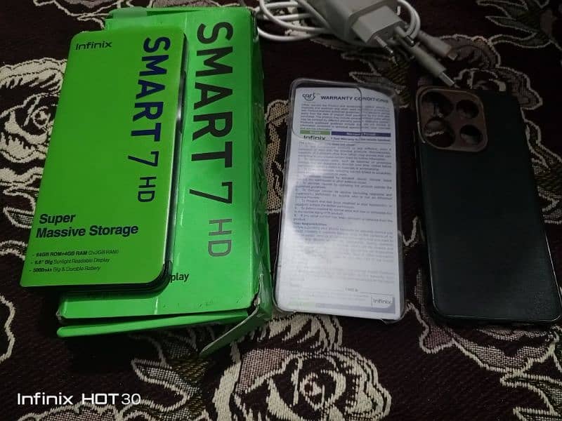 infinix smart 7hd  with box 10/10 condition under warranty 13