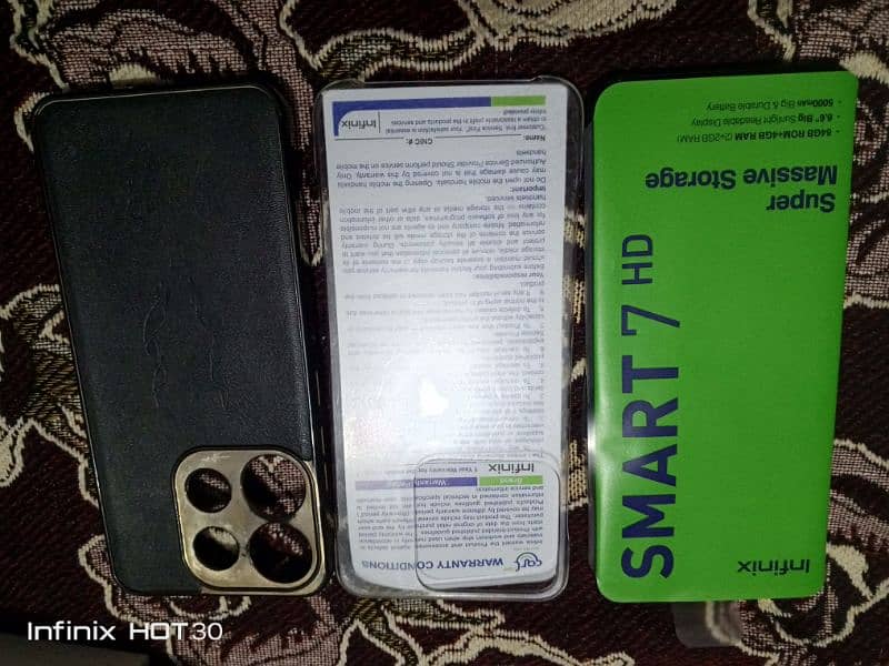 infinix smart 7hd  with box 10/10 condition under warranty 15