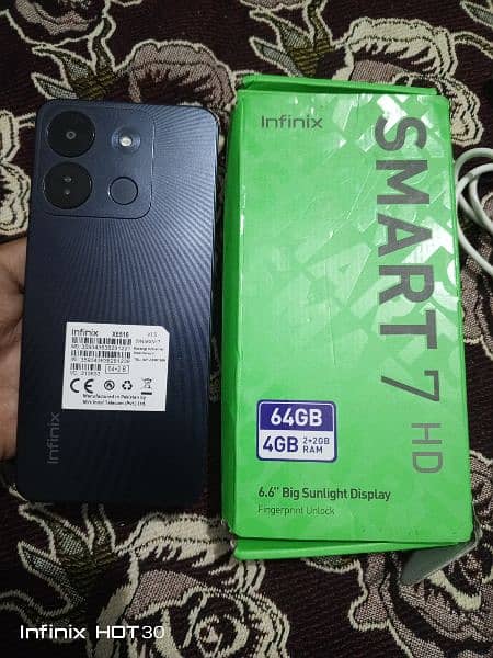 infinix smart 7hd  with box 10/10 condition under warranty 16