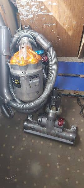 Vacuum cleaner with converter  110. ( DYSON company ) 0