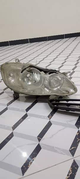 selling head light and front jaali totoyta 2005 model 5