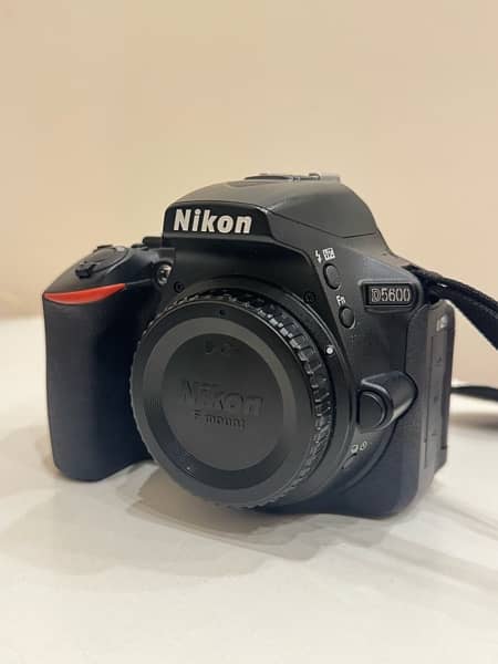 Nikon d5600 + Nikkor 50mm 1.8 + 18 - 55mm kit lens + Accessories 2