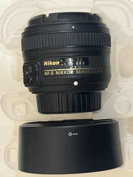 Nikon d5600 + Nikkor 50mm 1.8 + 18 - 55mm kit lens + Accessories 10