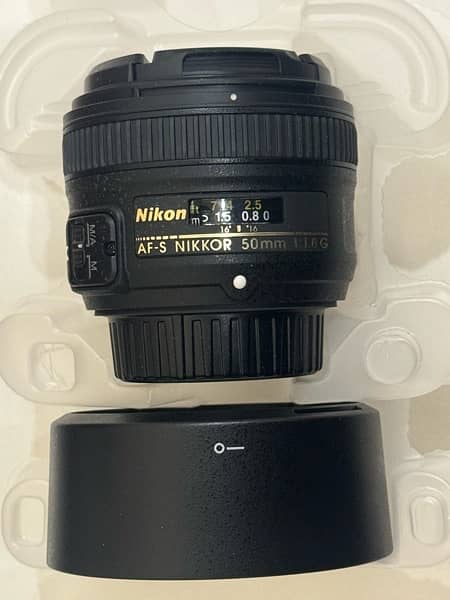 Nikon d5600 + Nikkor 50mm 1.8 + 18 - 55mm kit lens + Accessories 11