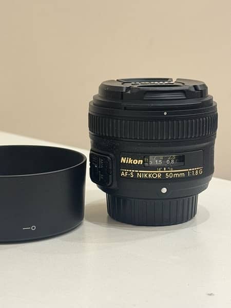 Nikon d5600 + Nikkor 50mm 1.8 + 18 - 55mm kit lens + Accessories 12