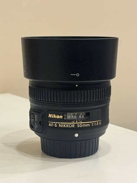 Nikon d5600 + Nikkor 50mm 1.8 + 18 - 55mm kit lens + Accessories 13
