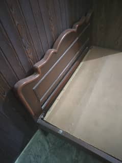Two Single beds ( Wooden Made)