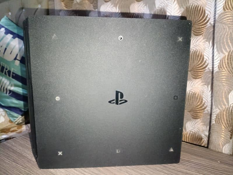 PS4 Pro 4K 1TB CUH-7216B with Controllers and a disc 7