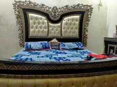 King sized wooden bed and dressing for sale.