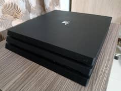 PS4 Pro 4K 1TB CUH-7216B with Controllers and a disc