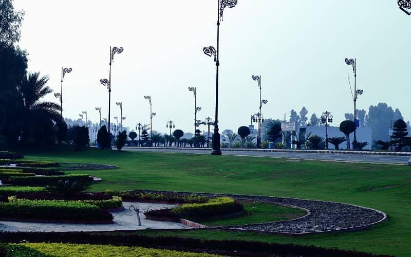7.15 Marla Facing Park Plot for Sale in C Block Palm City Lahore 13