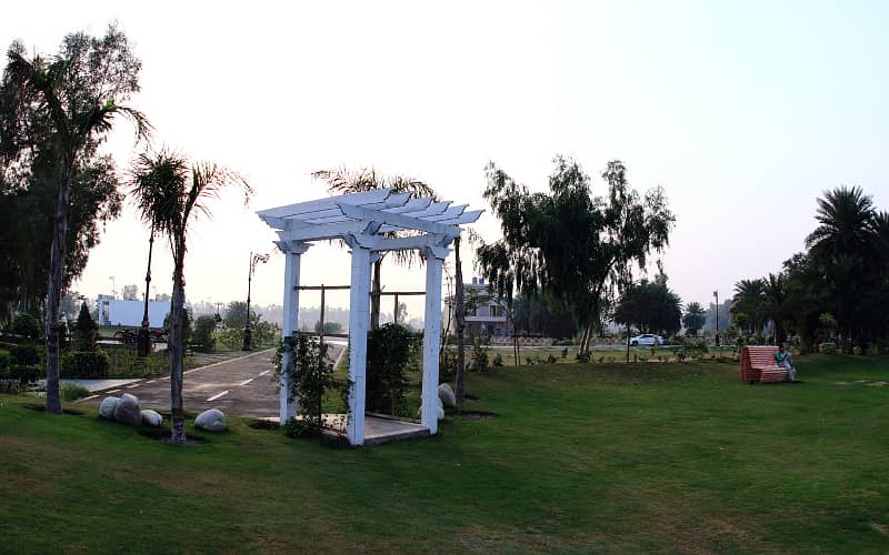 7.15 Marla Facing Park Plot for Sale in C Block Palm City Lahore 28