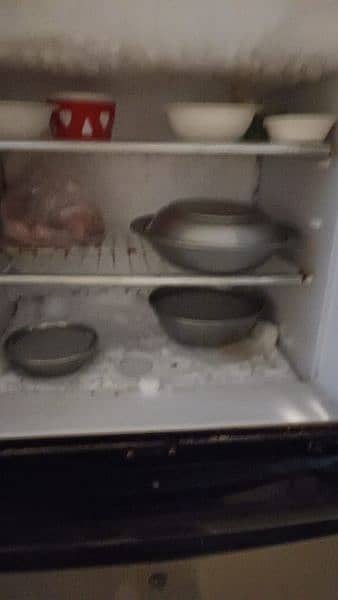 use fridge bilkul ok hai koi kharabi cooling achi karta hai hai 1