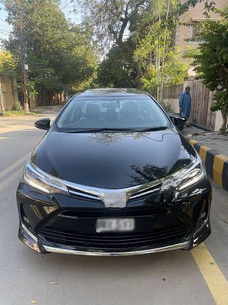 Toyota Corolla black x avaliable for rent in pakpattan and arifwala 0