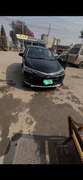 Toyota Corolla black x avaliable for rent in pakpattan and arifwala 2